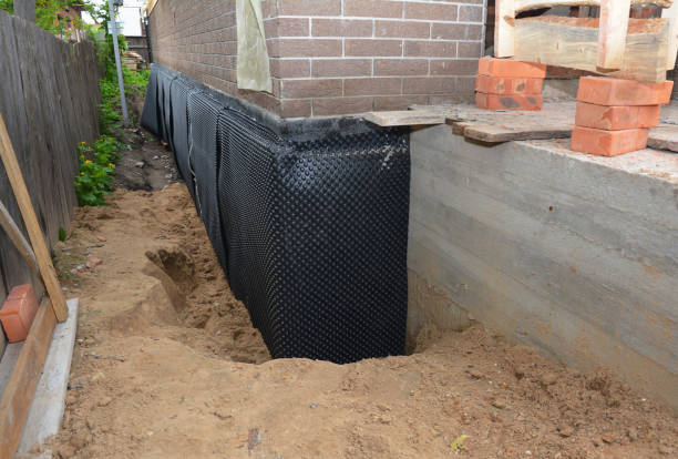 Happy homeowners after waterproofing job in Van Wert